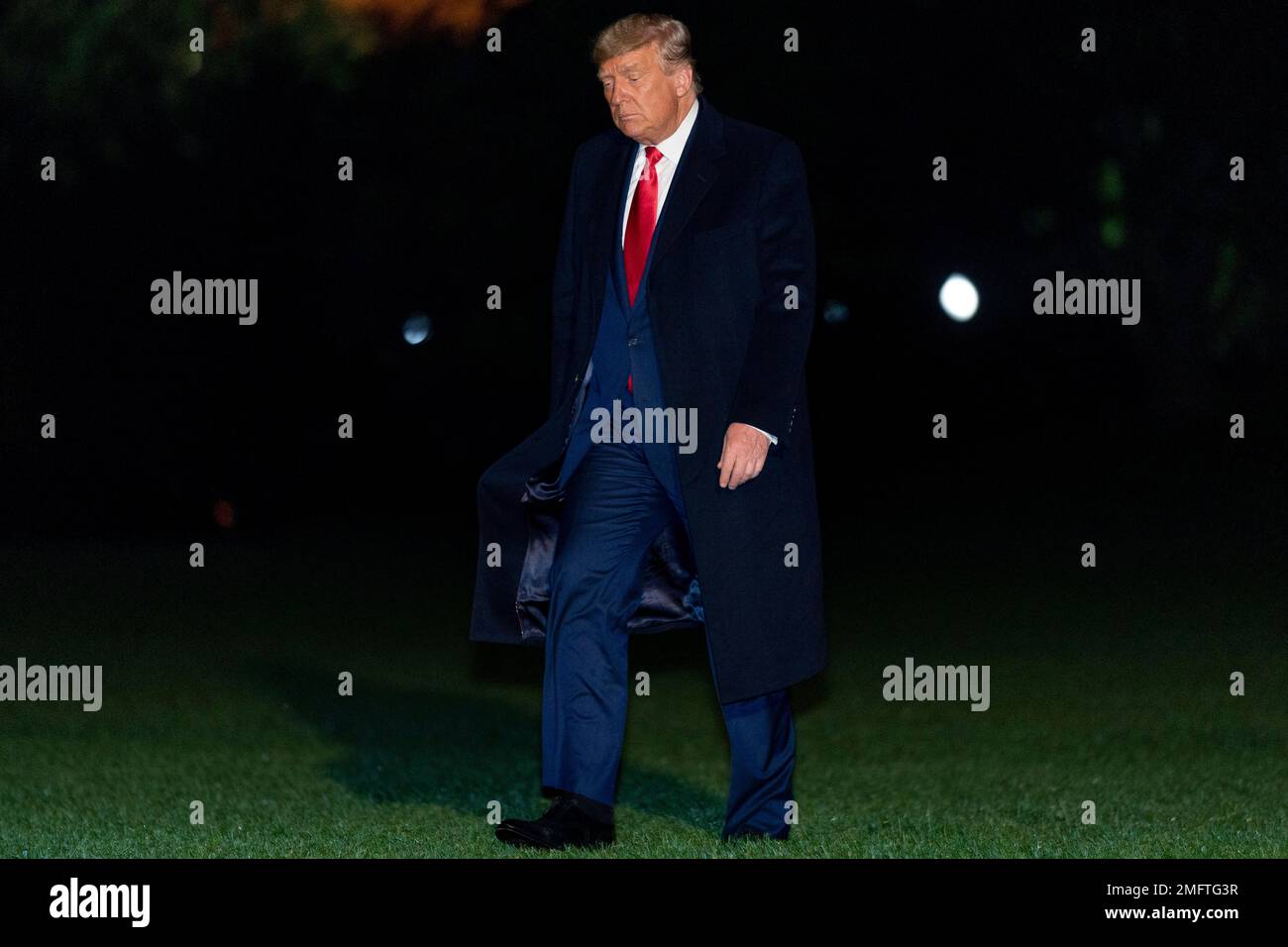 President Donald Trump returns to the White House in Washington ...