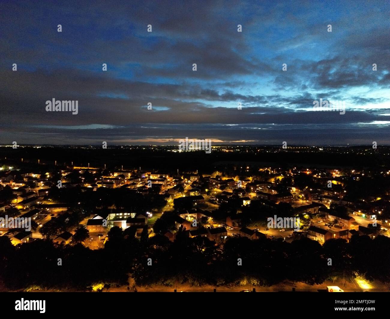 An aerial view of the city buildings with bright lights Stock Photo - Alamy
