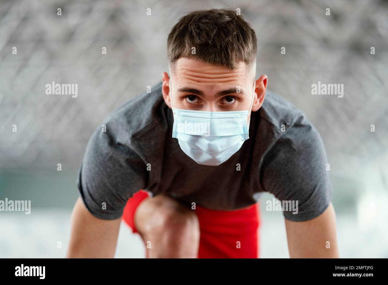 medium shot athlete wearing mask Stock Photo Alamy