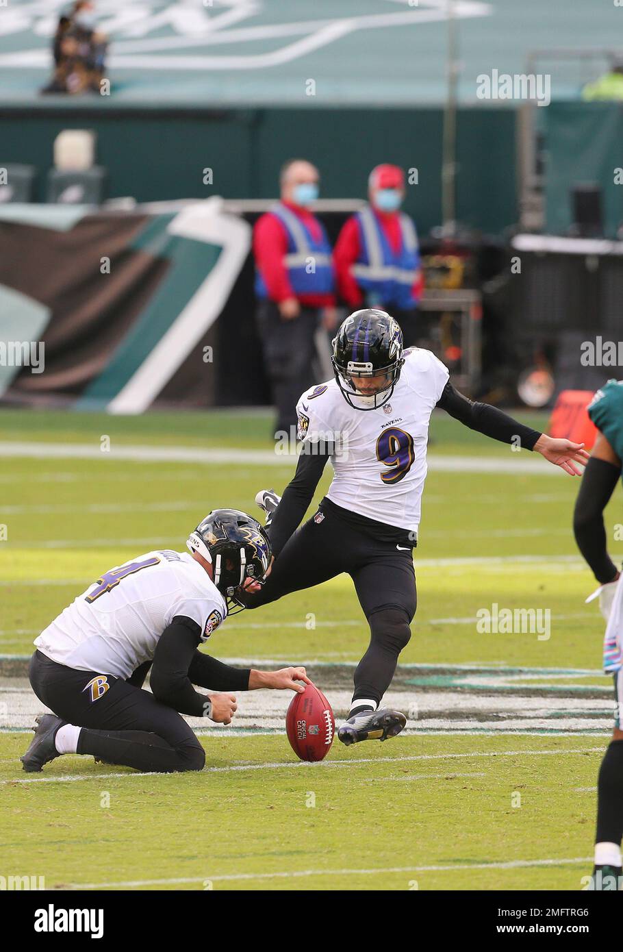 Baltimore Ravens' Justin Tucker (9) attempts a field goal as Sam