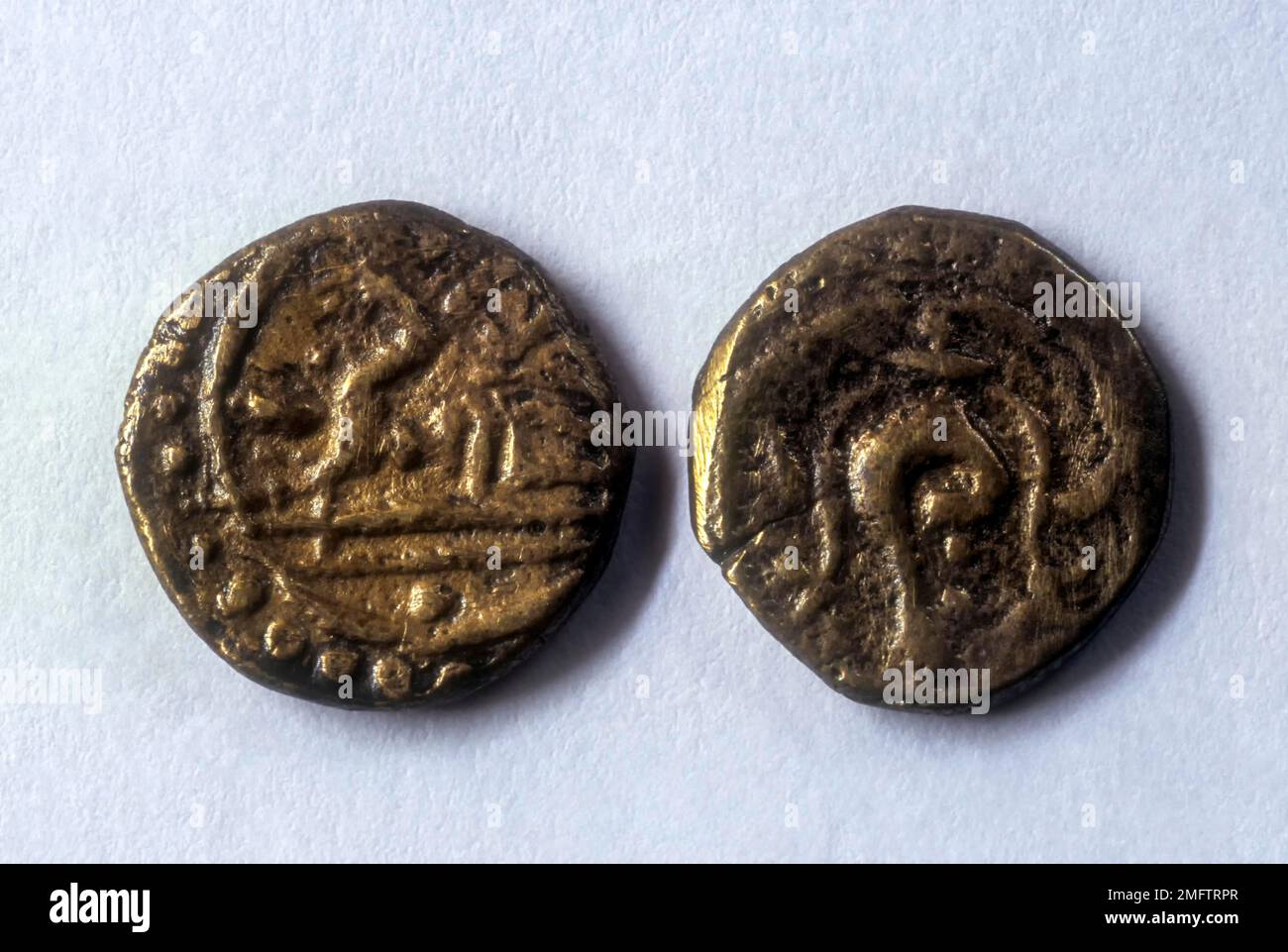 1, 16th century copper and Bronze coin Venadu Chera, Travancore Ananthasayana Kasu, Obv, Padmanabha Deity (left), 2, 16th century copper and Bronze Stock Photo