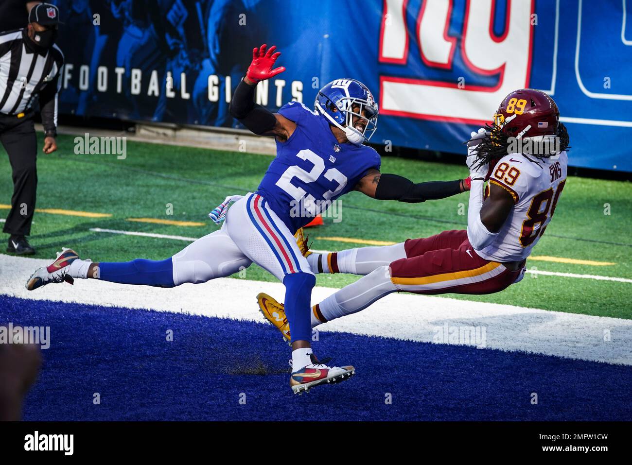 New York Giants' Logan Ryan, left, tackles Los Angeles Rams' Tyler Higbee  during the first half of an NFL football game, Sunday, Oct. 17, 2021, in  East Rutherford, N.J. (AP Photo/Frank Franklin