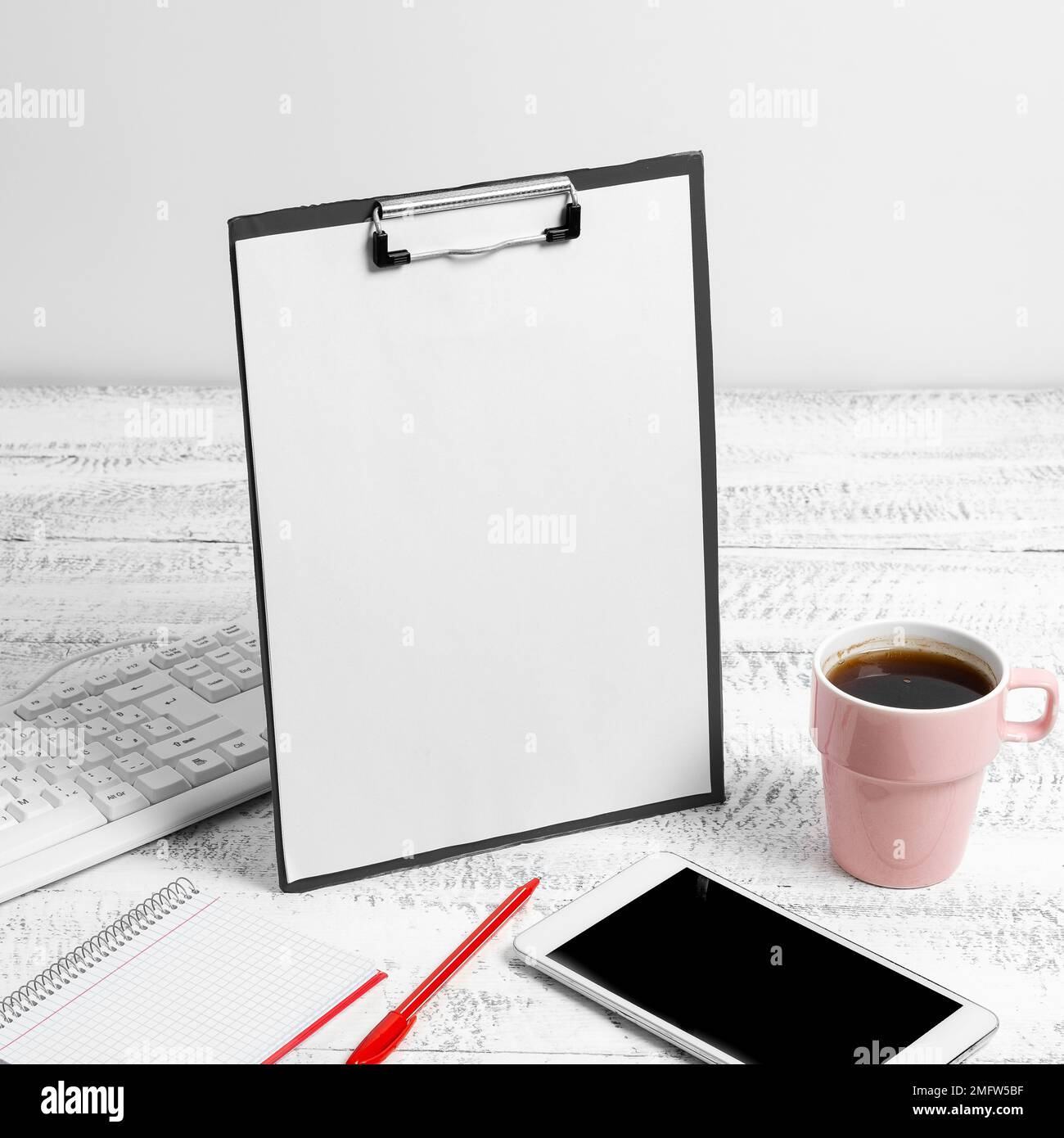Notebook With Important Messages On Desk With Coffee, Phone And Pen. Crutial Informations Written On Pad On Table With Cup, Memos And Pencil. Late Stock Photo
