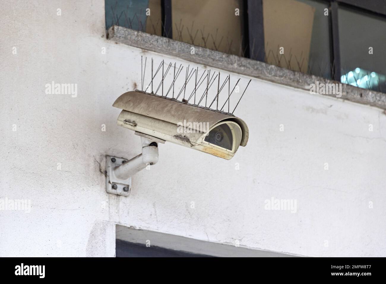 Video Surveillance Cctv Camera With Bird Control Spikes Stock Photo