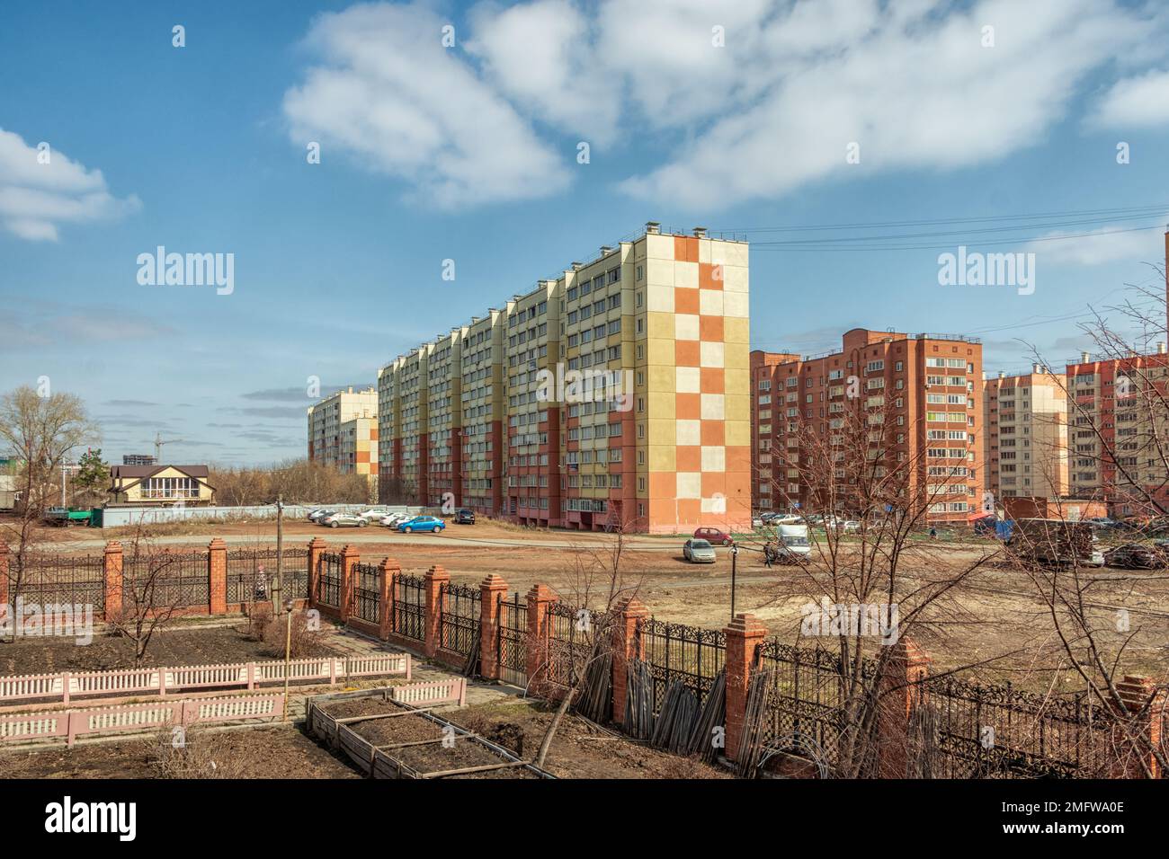 Urban landscape, multi-storey residential buildings against the background of a cloudy sky. The photo was taken in Kopeysk, Chelyabinsk region, Russia Stock Photo