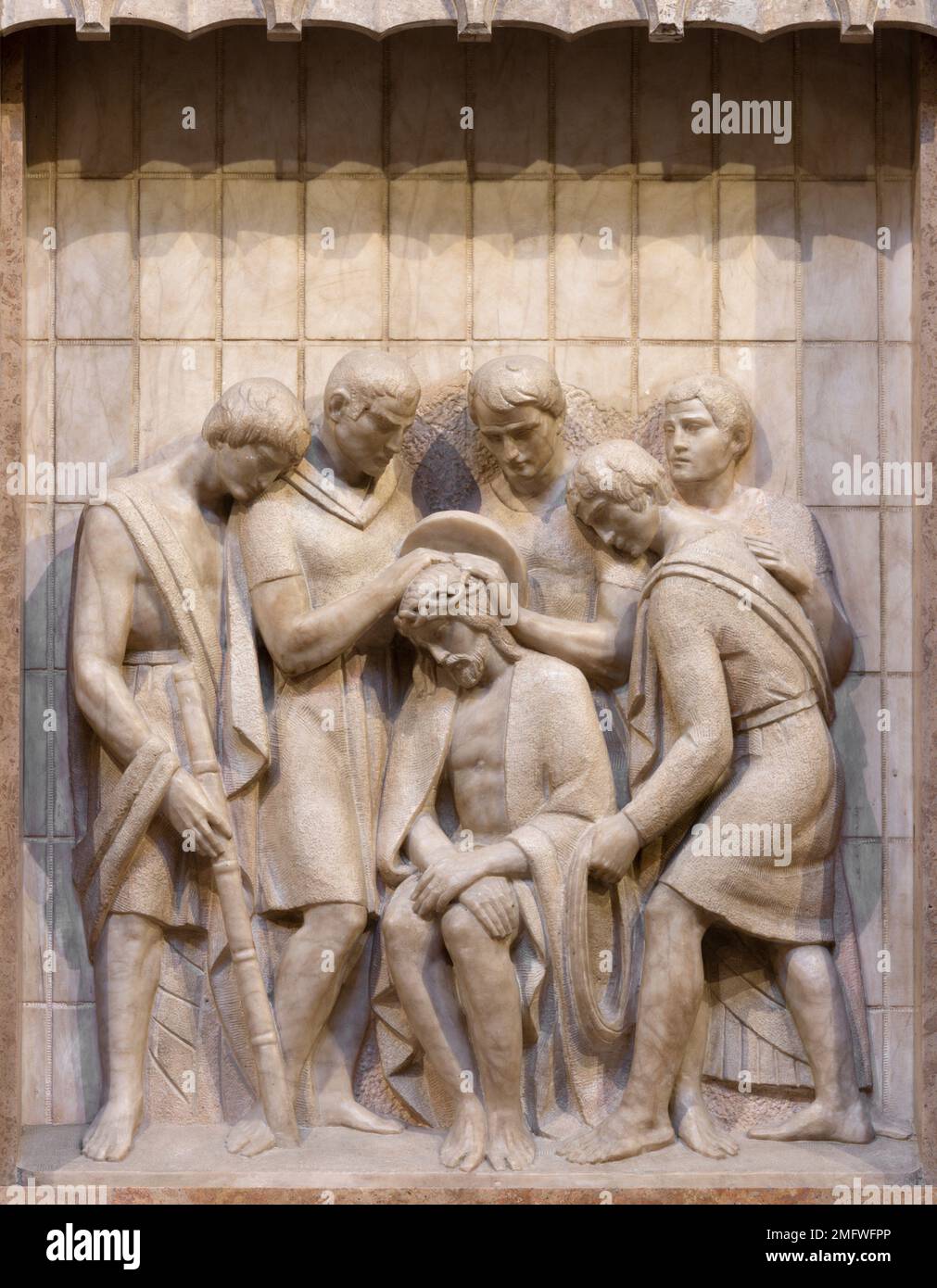 VALENCIA, SPAIN - FEBRUARY 17, 2022: The marble relief of Crowning of the thorns in the church Basilica de San Vicente Ferrer from 20. cent. Stock Photo