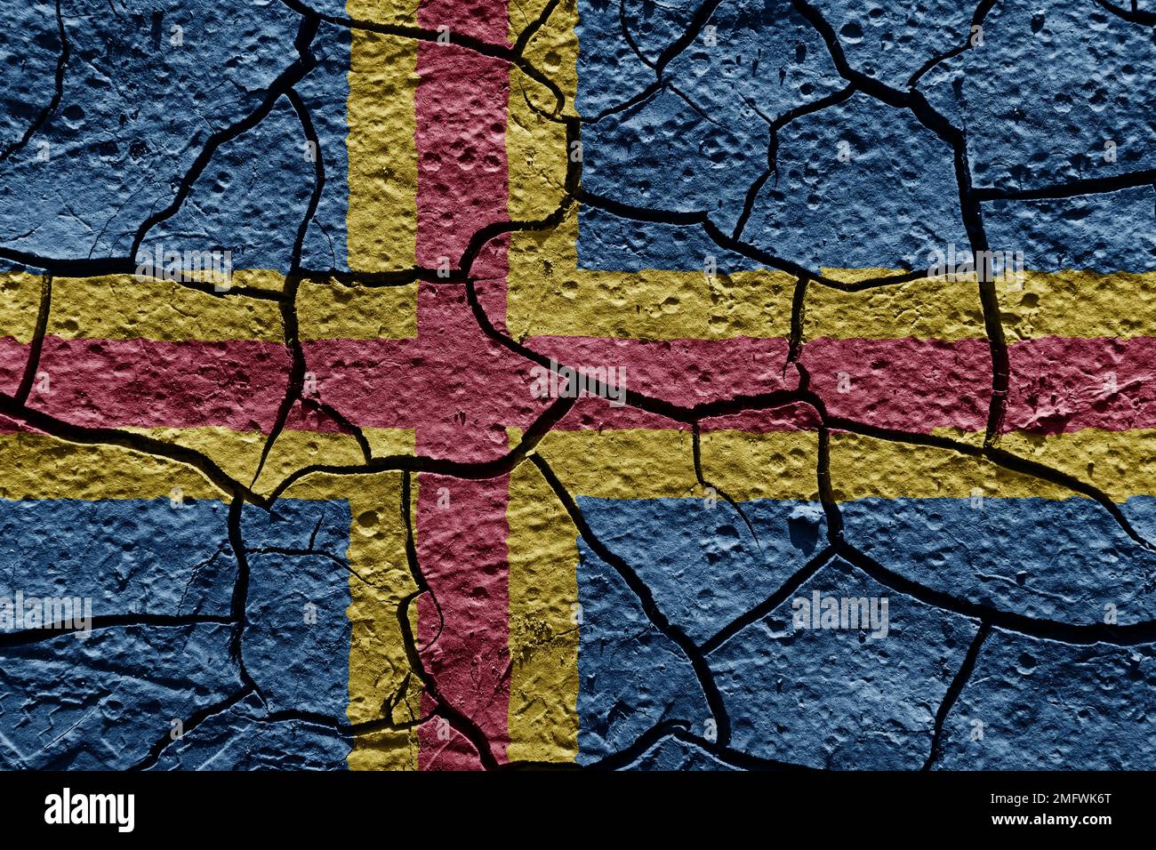 Aland flag on a mud texture of dry crack on the ground Stock Photo