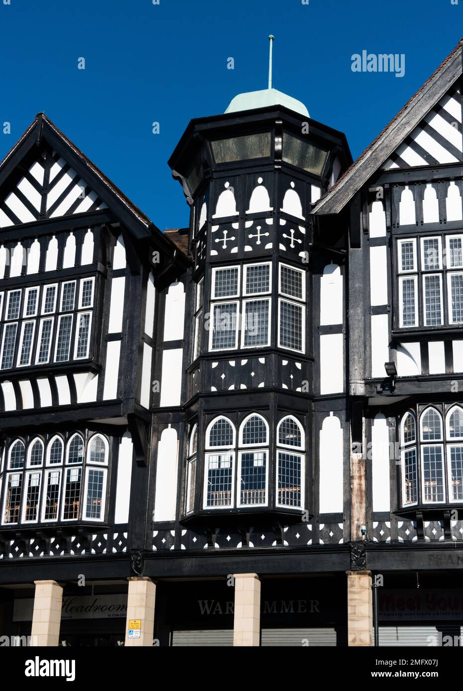 Image of the black and white mock tudor 1920's buildings on Knifesmithgate in the market town of Chesterfield, Derbyshire. Stock Photo