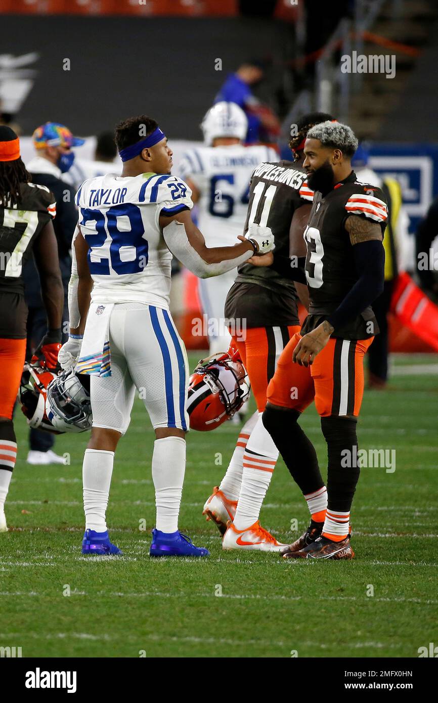 Indianapolis Colts running back Jonathan Taylor (28) shakes hands with  Cleveland Browns wide receiver Odell Beckham Jr. (13) after an NFL football  game, Sunday, Oct. 11, 2020, in Cleveland. (AP Photo/Kirk Irwin