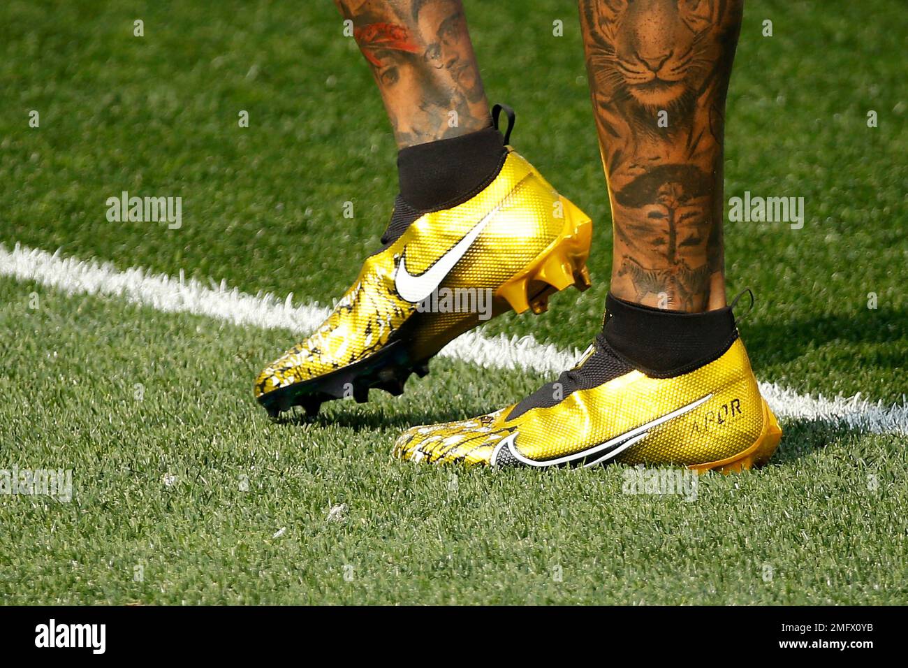 A detail of the Nike cleats worn by Cleveland Browns wide receiver Odell  Beckham Jr. (13) while warming up prior to the start of an NFL football  game against the Indianapolis Colts,