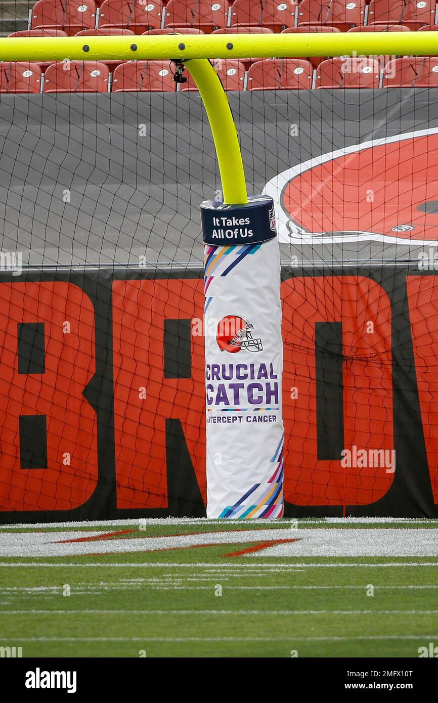 A goal post is wrapped in a Crucial Catch banner during an NFL football  game between the Seattle Seahawks and Arizona Cardinals, Sunday, Oct. 25,  2020, in Glendale, Ariz. (AP Photo/Jennifer Stewart