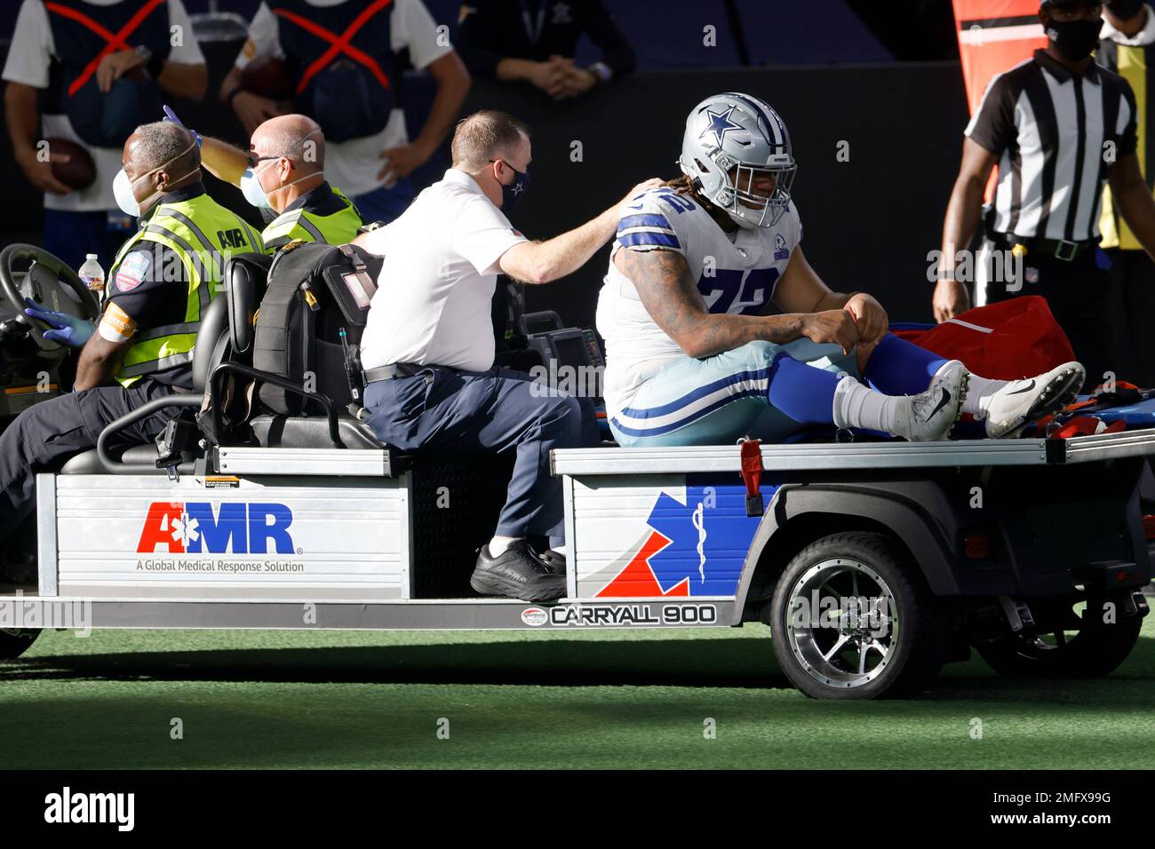 Dallas Cowboys' Trysten Hill leaves on cart with injury