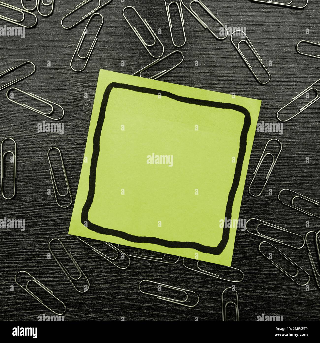 Paperclips Around Important Informations On Desk. Presented Recent Updates. Stock Photo