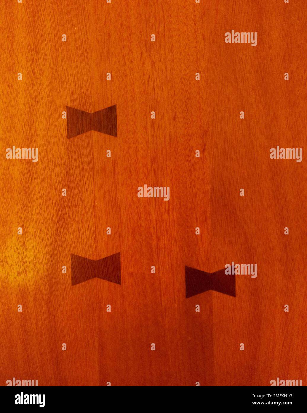 Orange Wood Stained Door with Wood Grain and Three Dovetails, Tie Joins