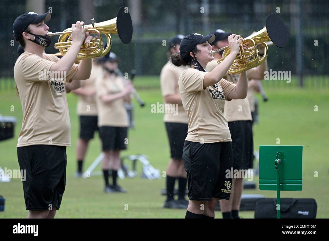 Central Florida marching band members perform outside the stadium