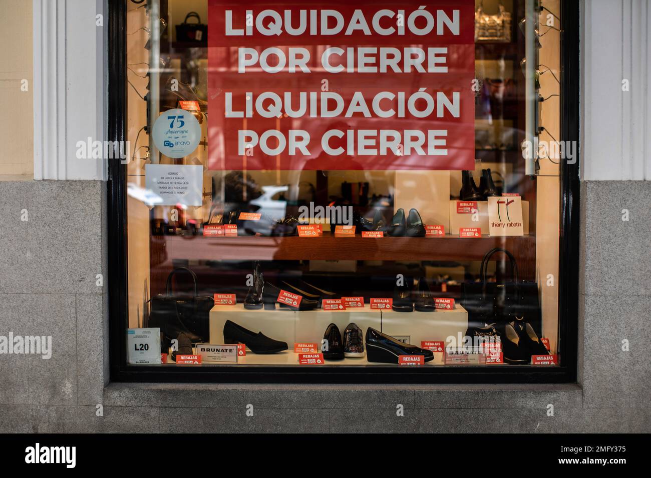 Detail of the window-shop of a shoes shop announcing a clearance sale in  Madrid, Spain, Tuesday, Oct. 6, 2020. On Wednesday, Spanish Prime Minister  Pedro Sánchez has unveiled a major plan to