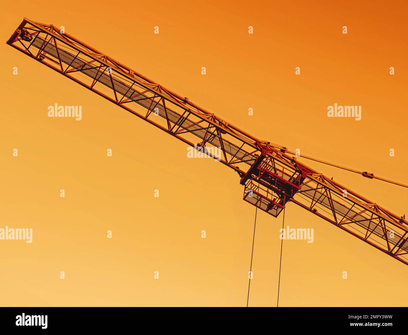 construction crane jib, at sunset Stock Photo Alamy