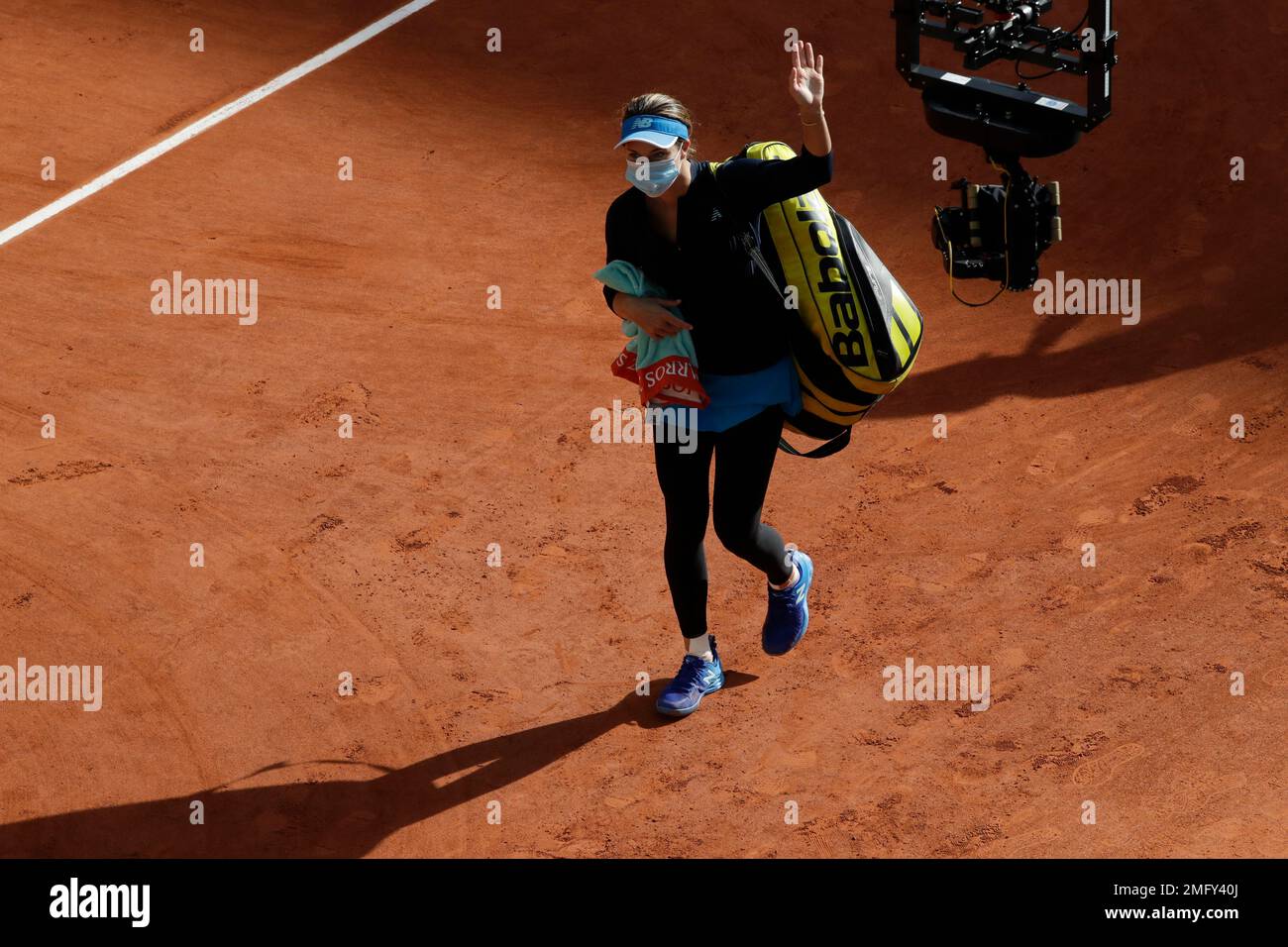 A remote controlled camera follows Danielle Collins of the U.S. as she