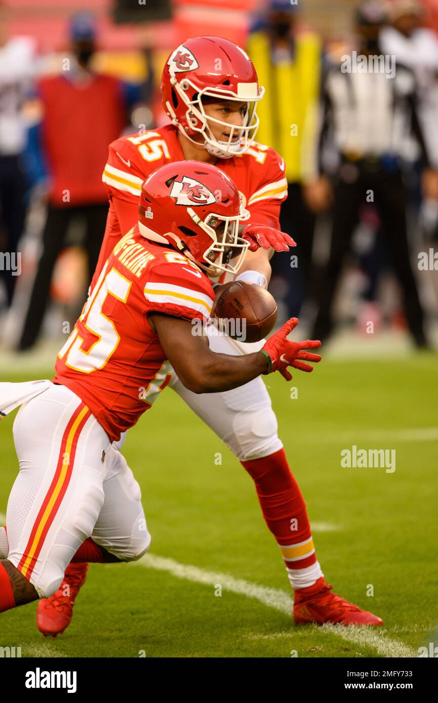 Kansas City Chiefs quarterback Patrick Mahomes (15) hands off to