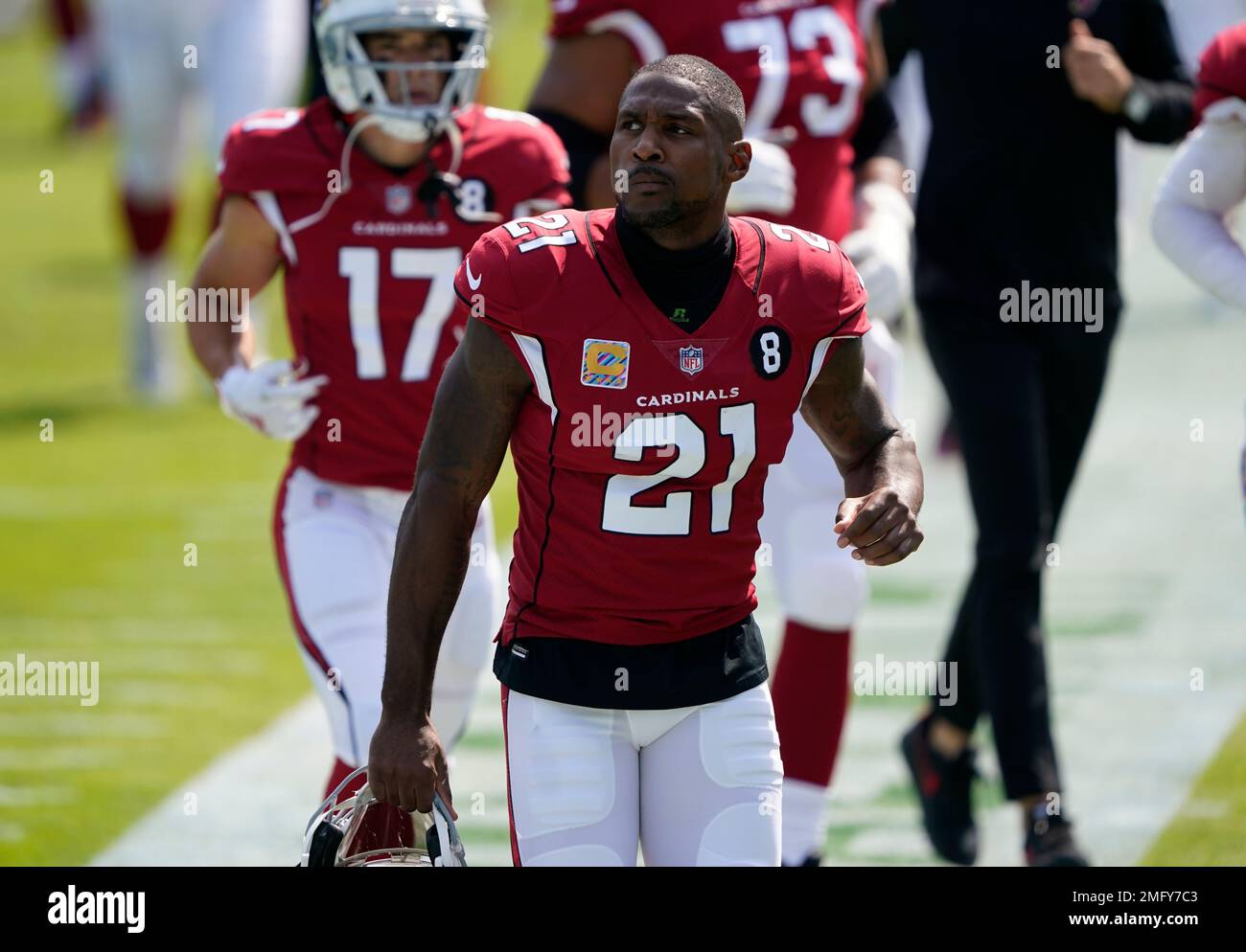 Arizona Cardinals cornerback Patrick Peterson (21) heads back to the tunnel  following warm ups before the start of an NFL football game against the  Carolina Panthers Sunday, Oct. 4, 2020, in Charlotte