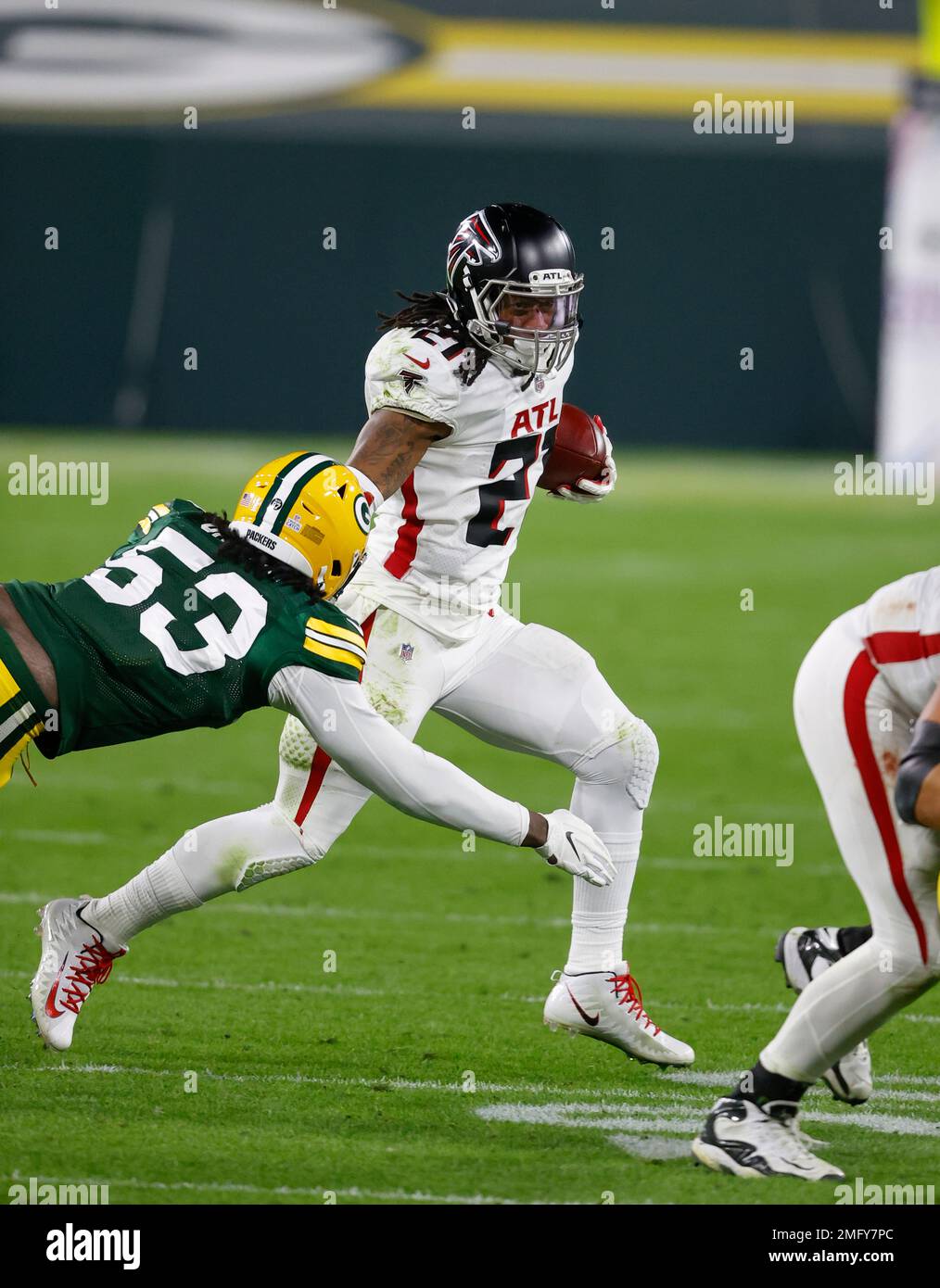 Atlanta Falcons running back Todd Gurley, 21, and Damontae Kazee, 27, walk  off the field after falling 30-26 to the Chicago Bears in an NFL football  game on Sunday, Sept. 27, 2020