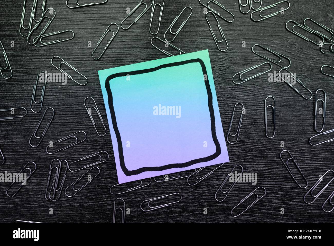 Paperclips Around Important Informations On Desk. Presented Recent Updates. Stock Photo