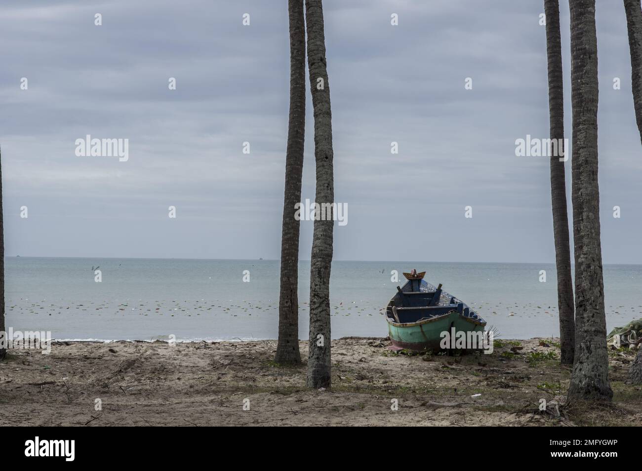 beach with a fishing boat in muine vietnam Stock Photo