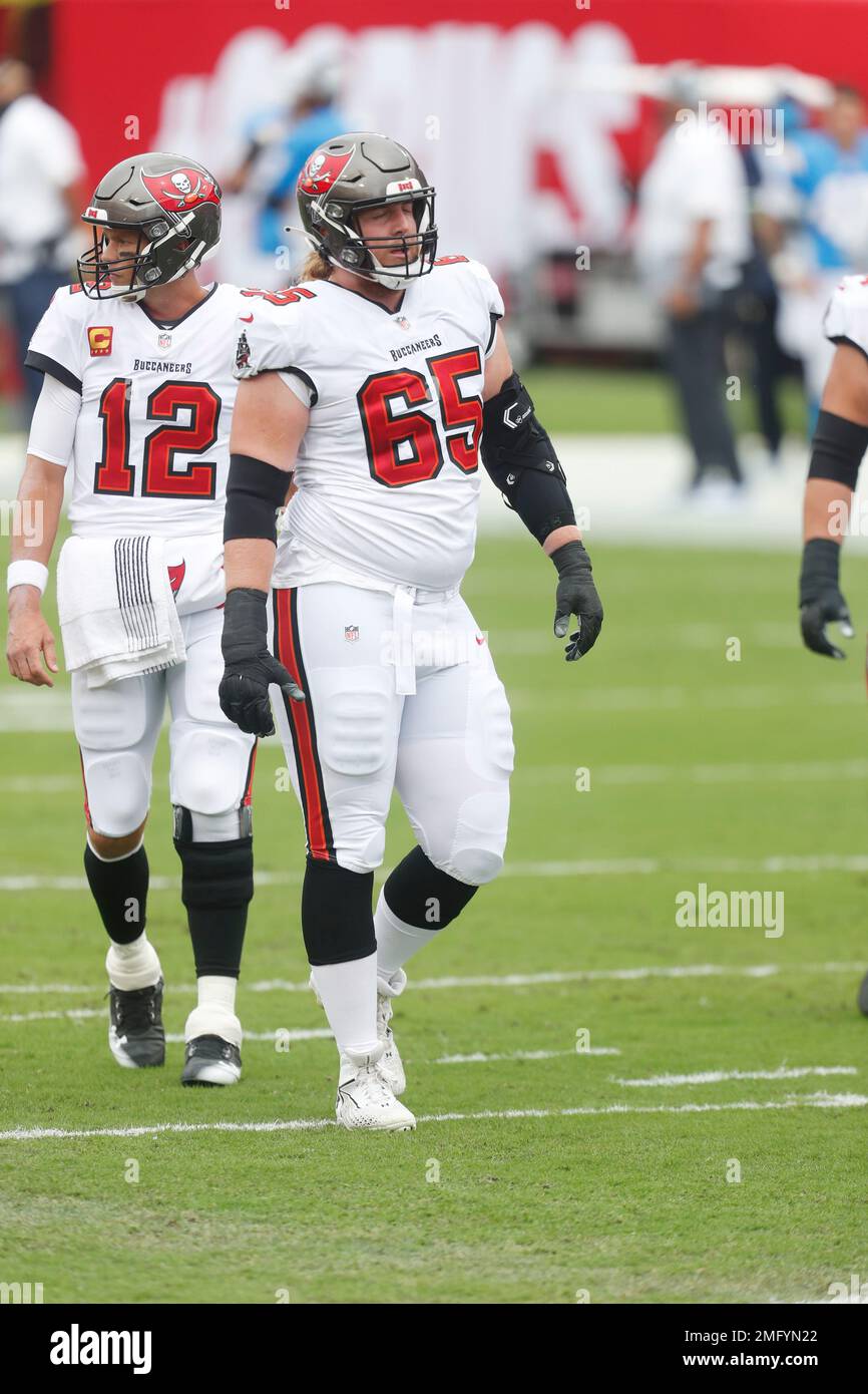 Tampa Bay Buccaneers offensive guard Alex Cappa (65) prepares to play  another down against the Los Angeles Chargers defense during the first half  in an NFL football game, Sunday, Oct. 4, 2020