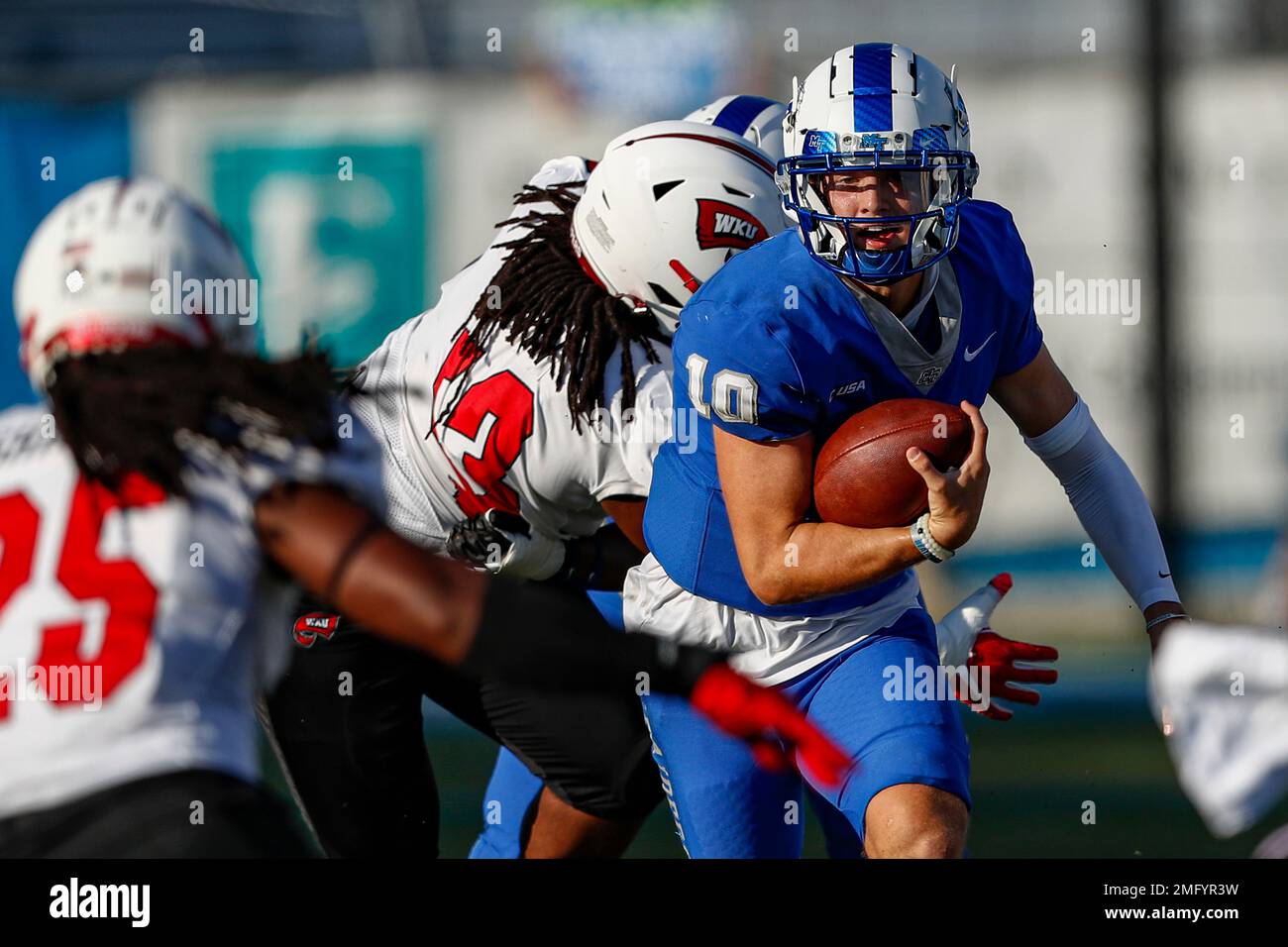 Middle Tennessee quarterback Asher O'Hara (10) runs for yardage during