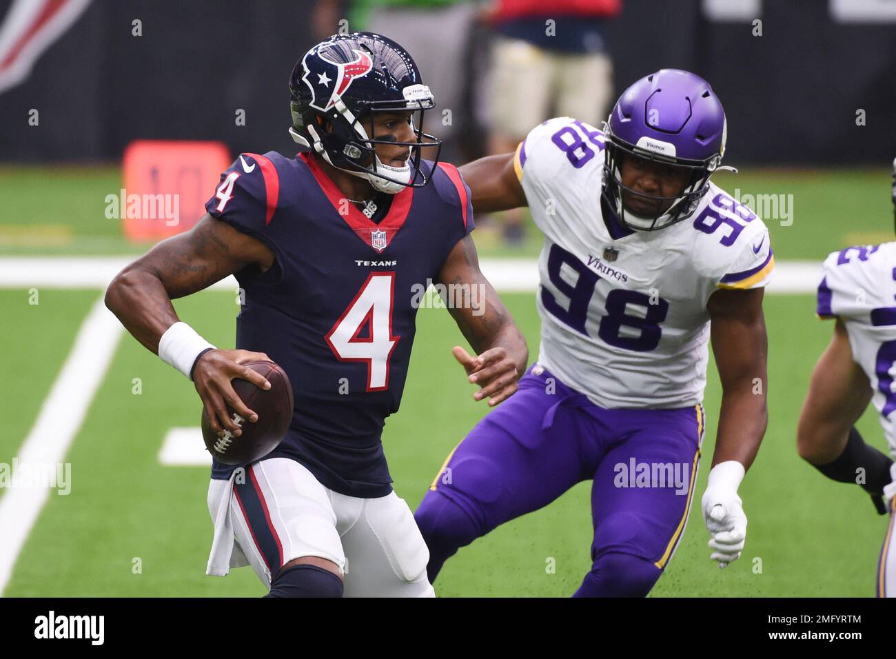 Houston Texans quarterback Deshaun Watson (4) is pressured by Minnesota
