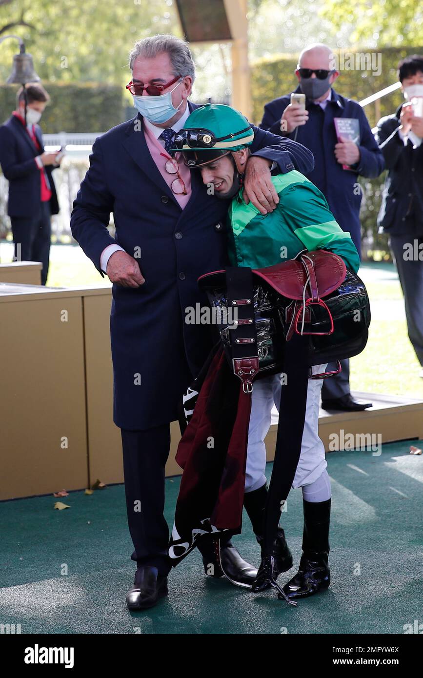 Congratuated Jockey Cristian Demuro is congratuated after winning the Qatar Arc de ...