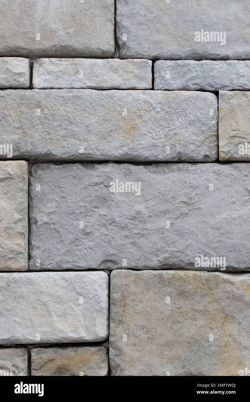 Large stone wall grey texture background, close up Stock Photo