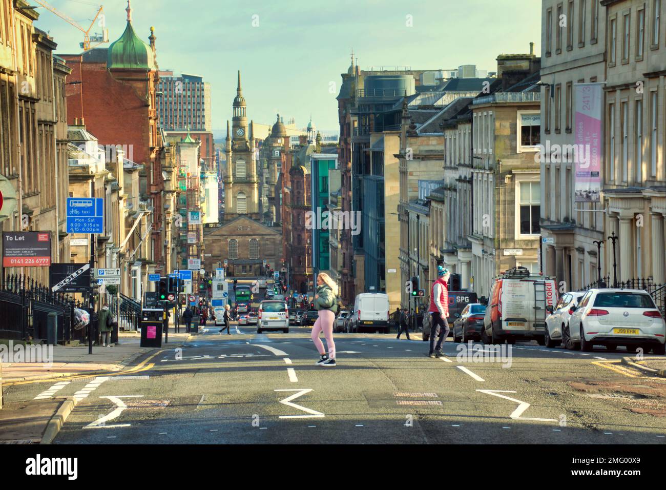 Glasgow, Scotland, UK 25tht January, 2023. UK Weather:   Dry saw a change from the recent inclement weather as people took back the streets in the city West george street in the sunshine.. Credit Gerard Ferry/Alamy Live News Stock Photo