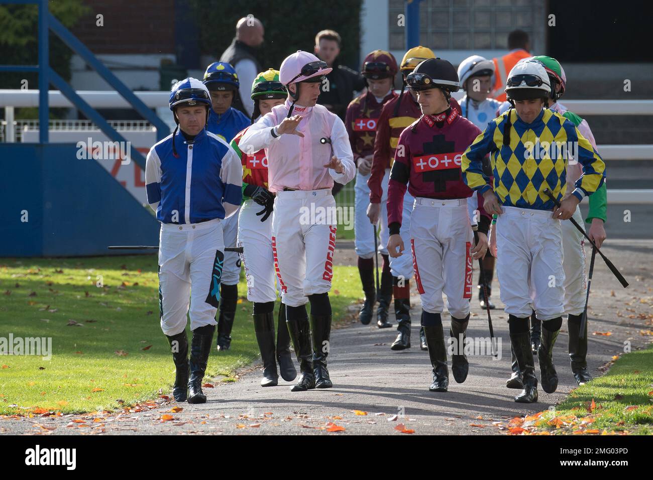 Windsor, Berkshire, UK. 10th October, 2022. Jockeys head to the Parade Ring before racing in the