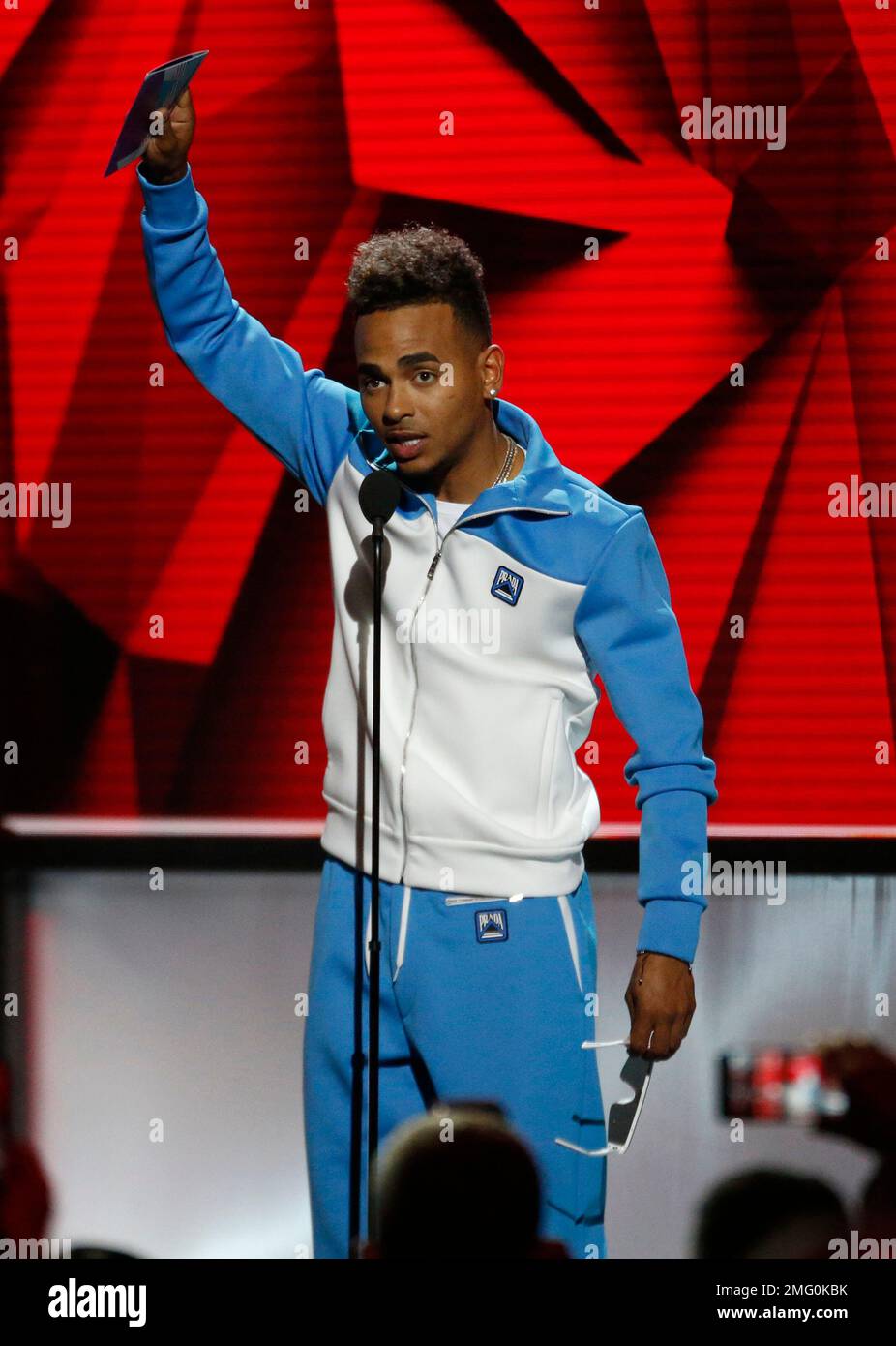 FILE - Ozuna accepts the award for artist of the year at the Billboard ...