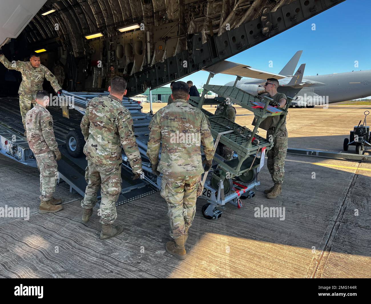 https://c8.alamy.com/comp/2MG144R/airmen-assigned-to-the-new-york-air-national-guards-106th-rescue-work-with-members-of-the-new-york-air-national-guards-105th-airlift-wing-to-offload-106th-hh-60-pave-hawk-search-and-rescue-helicopters-from-105th-c-17s-at-a-brazilian-air-force-base-in-campo-grande-brazil-on-august-20-2022-the-airmen-were-in-brazil-to-participate-in-exercise-tapio-a-combined-brazilian-us-irregular-warfare-exercise-in-campo-grade-brazil-the-new-york-air-national-guard-dispatched-100-airmen-from-the-two-wings-to-participate-as-part-of-the-state-partnership-program-relationship-with-brazil-2MG144R.jpg