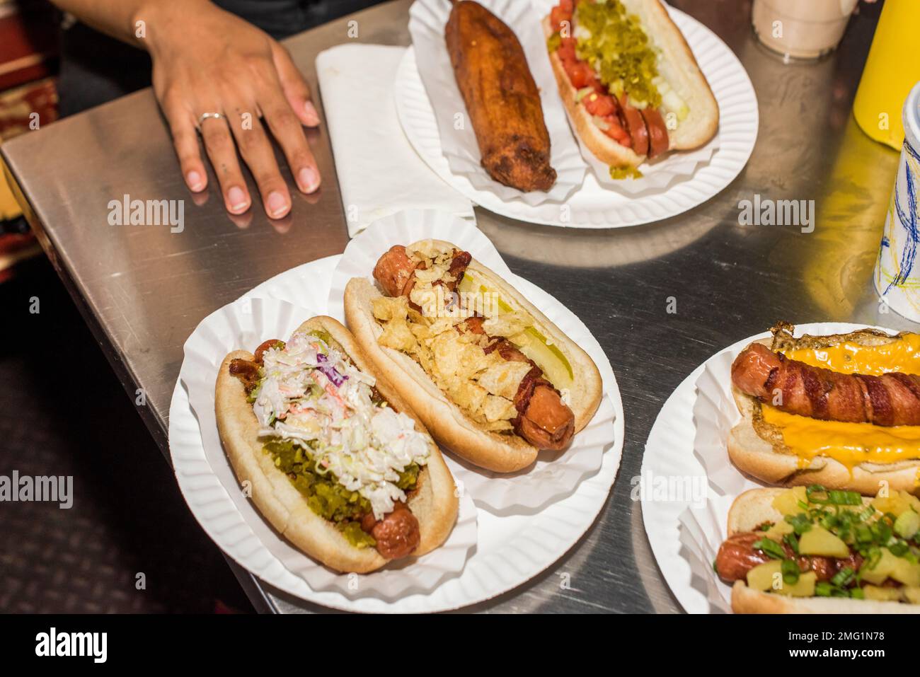 Hot dogs with corn dog on restaurant table Stock Photo