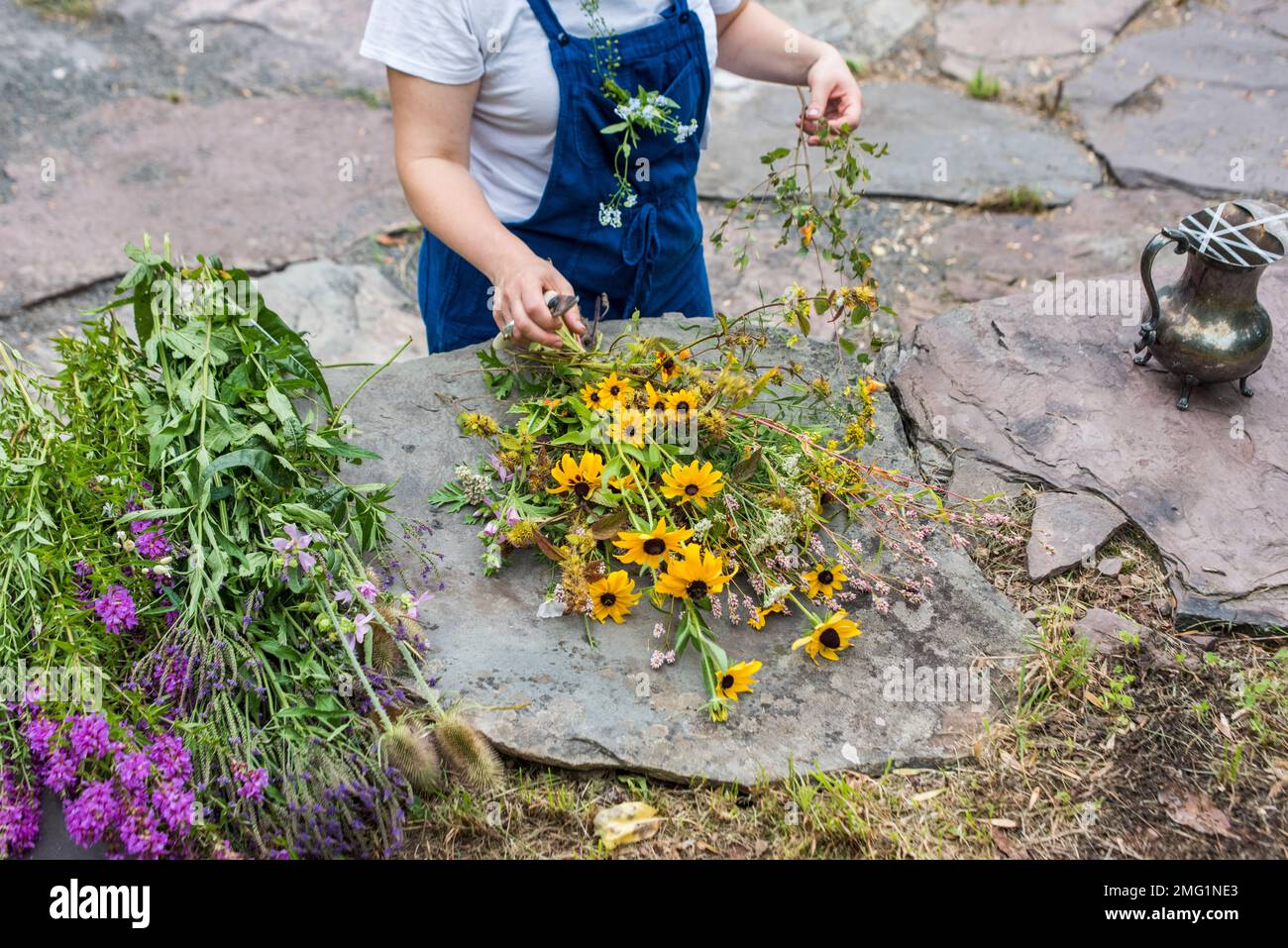 Floral Designer Creating Bouquet From Wildflowers Stock Photo Alamy