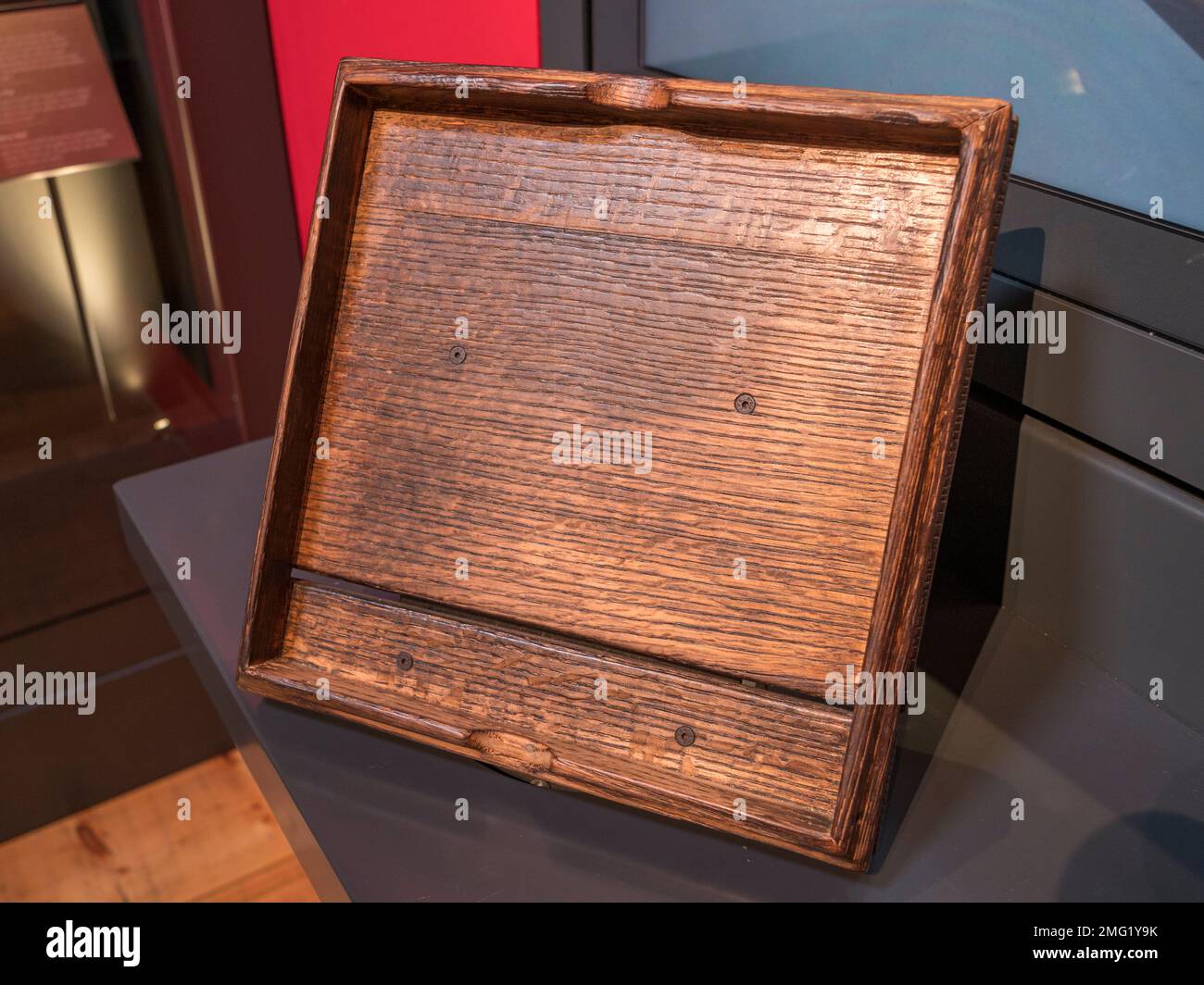 A square plate, as used by Ordinary Seamen to eat their food off (three