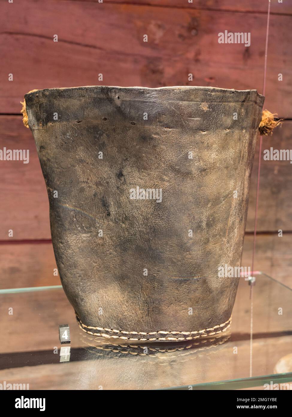 A leather water bucket, used at gun stations on a Royal Navy ship