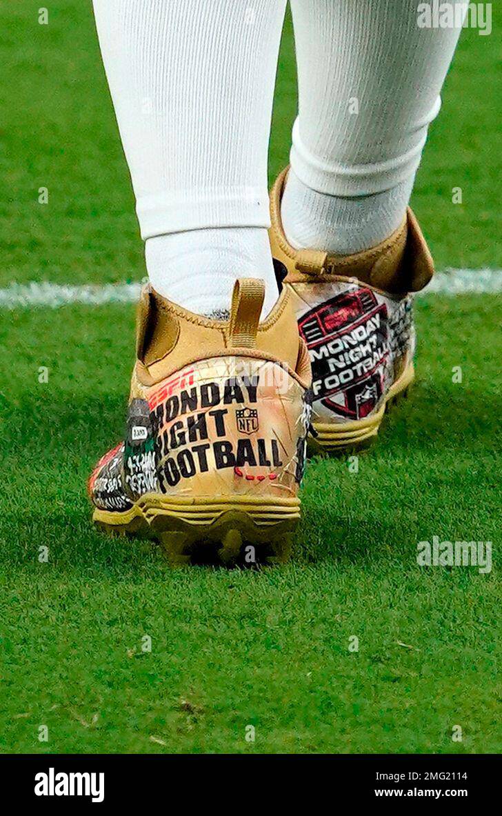 A detail shot of New Orleans Saints quarterback Drew Brees #9 cleats as he  walks on the field between plays against the Las Vegas Raiders during an  NFL football game, Monday, Sept.