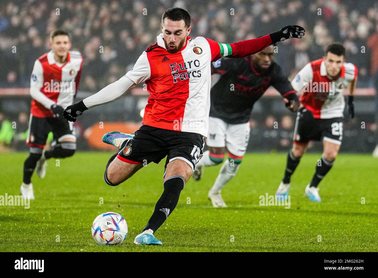 Rotterdam - Orkun Kokcu of Feyenoord scores the 2-0 during the match between Feyenoord v NEC Nijmegen at Stadion Feijenoord De Kuip on 25 January 2023 in Rotterdam, Netherlands. (Box to Box Pictures/Tom Bode) Stock Photo