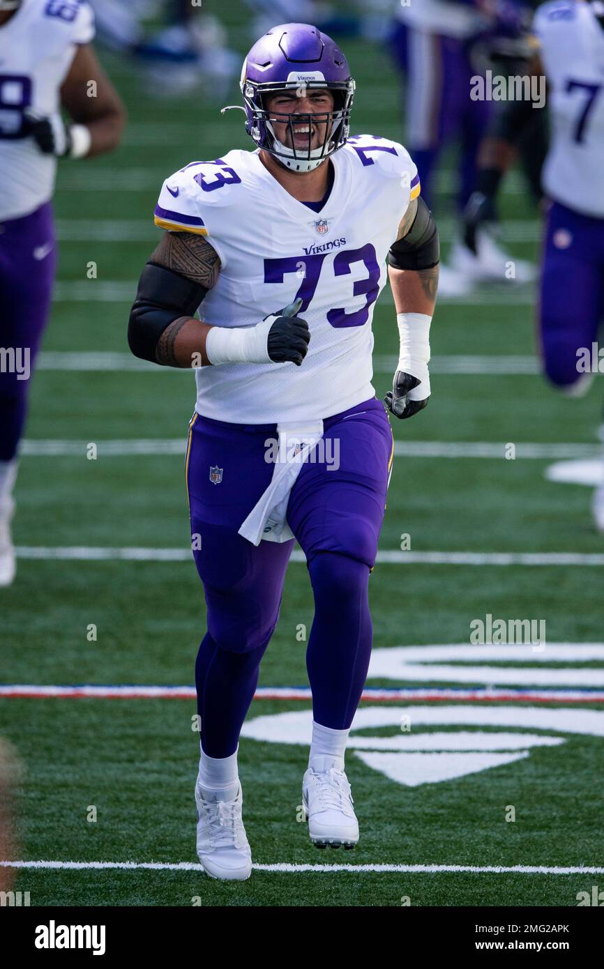 Minnesota Vikings guard Dru Samia 73 warms up on the field