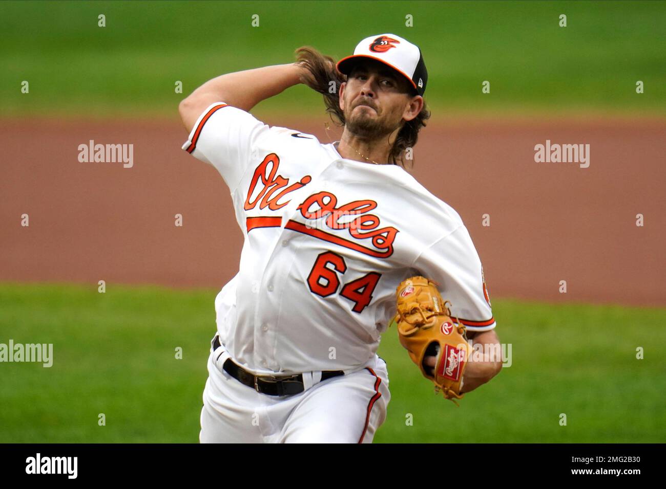 Baltimore Orioles starting pitcher Dean Kremer warms up prior to the