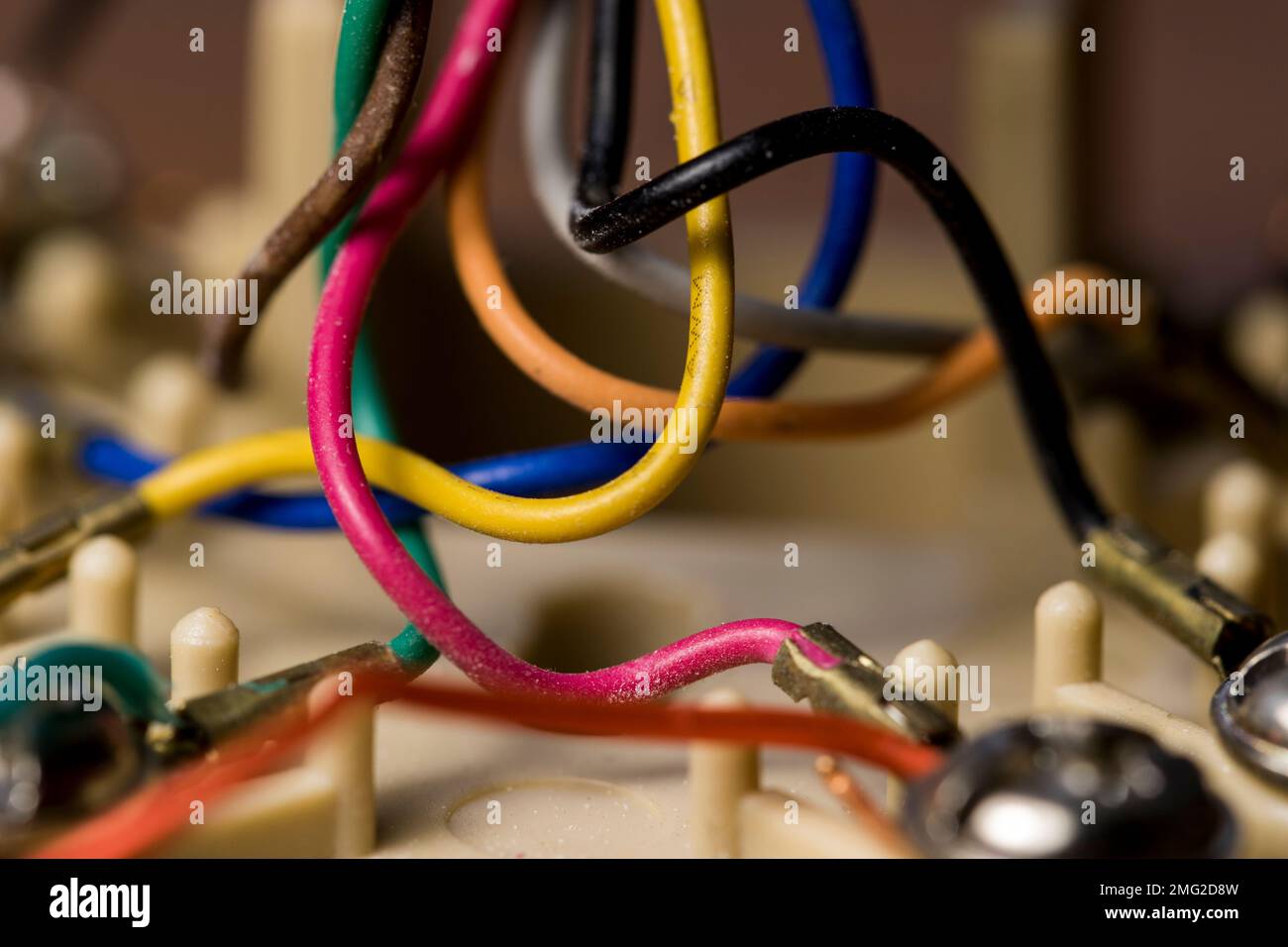DSL wire colored copper wire connectors close up. Multicolored copper cables in phone jack Stock