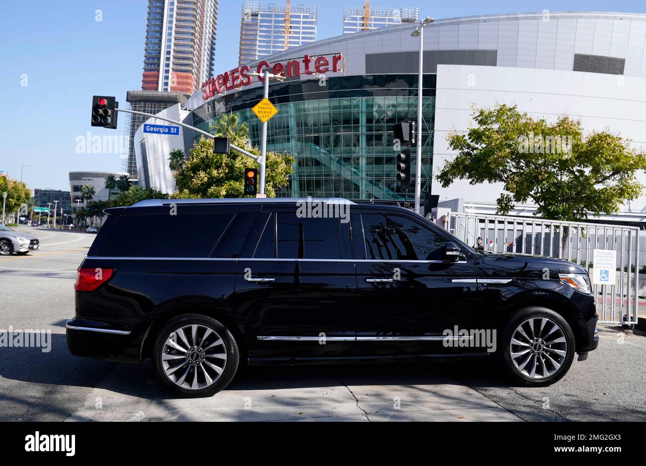 A limousine enters the Staples Center parking lot before the 72nd