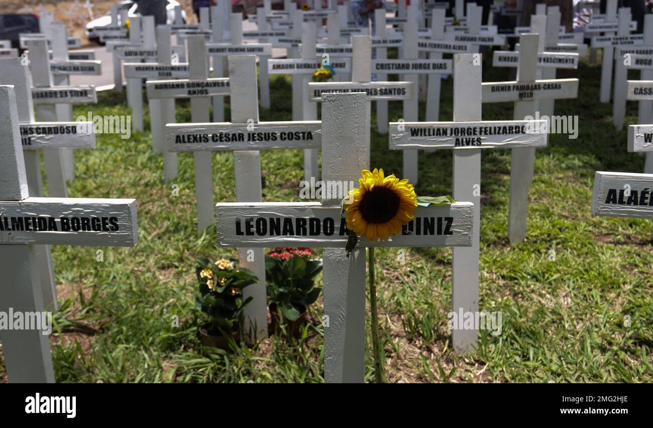 Brumadinho, Brazil. 23rd Jan, 2023. Names of the victims of the Brumadinho dam break symbolically on crosses at a meadow. The dam at the Corrego do Feijao mine in Brumadinho broke on January 25, 2019. At the time, a mudslide poured over the hilly landscape of the Brazilian state of Minas Gerais. Credit: Rodney Costa/dpa/Alamy Live News Stock Photo