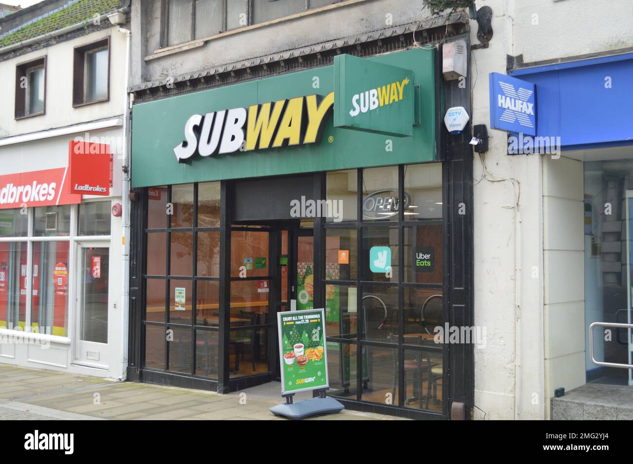 20th November 2022, Swansea, Wales, United Kingdom. Subway outlet next to Ladbrokes and Halifax on Union Street. Stock Photo