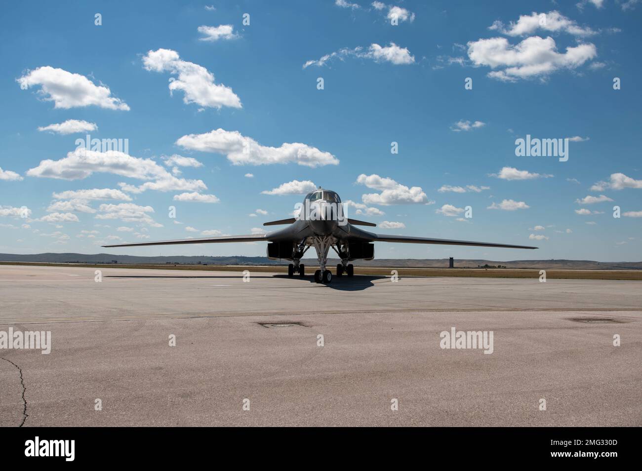 A U.S. Air Force B-1B Lancer, assigned to the 37th Bomb Squadron, taxis to a parking location at Ellsworth Air Force Base, S.D., upon landing from a long duration CONUS-to-CONUS mission to the Indo-Pacific region Aug. 20, 2022. The United States’ steadfast commitment to security and stability in the Indo-Pacific region remains unchanged. Stock Photo