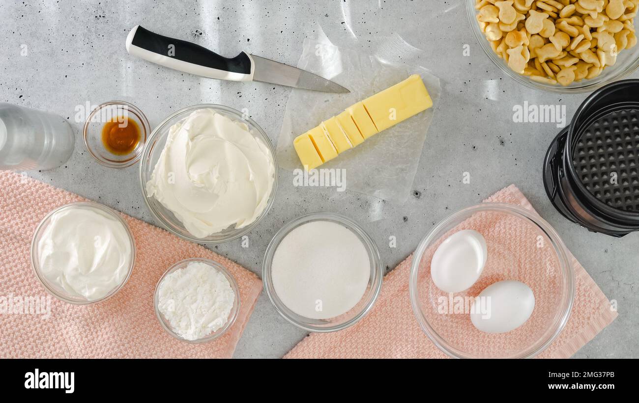 Cheesecake recipe. Ingredients closeup on the kitchen table. Cream